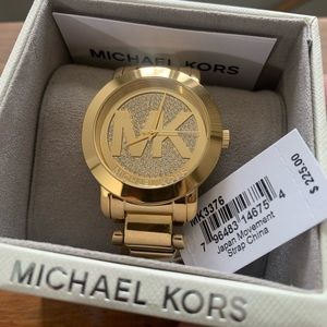 Brand New Michael Kors Women’s Gold watch with diamond face. Never worn/No flaws